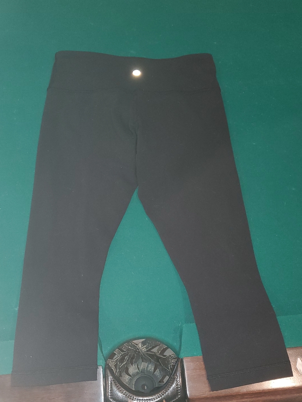 Black LuluLemon Cropped Workout Leggings with Reflective Logo